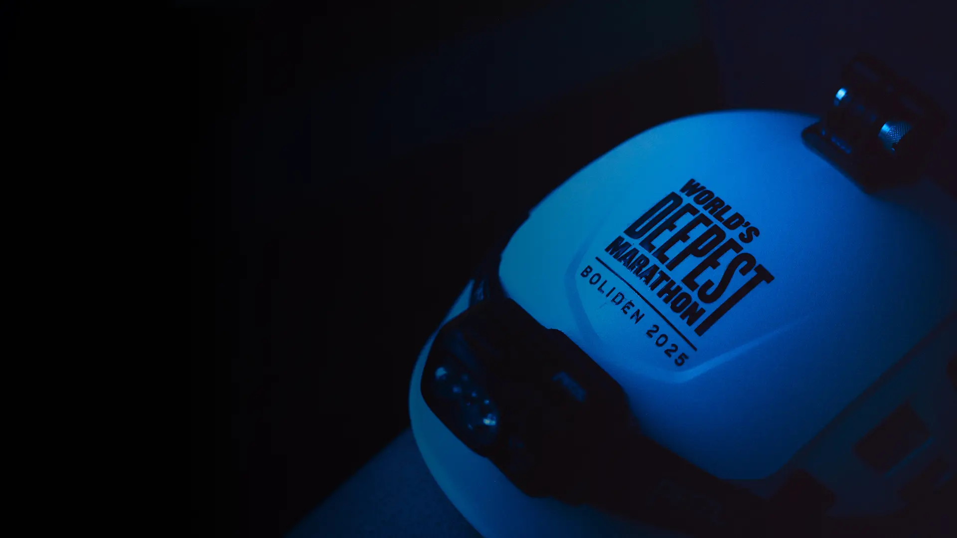 Petzl hemet with The World's Deepest Marathon logo on the front