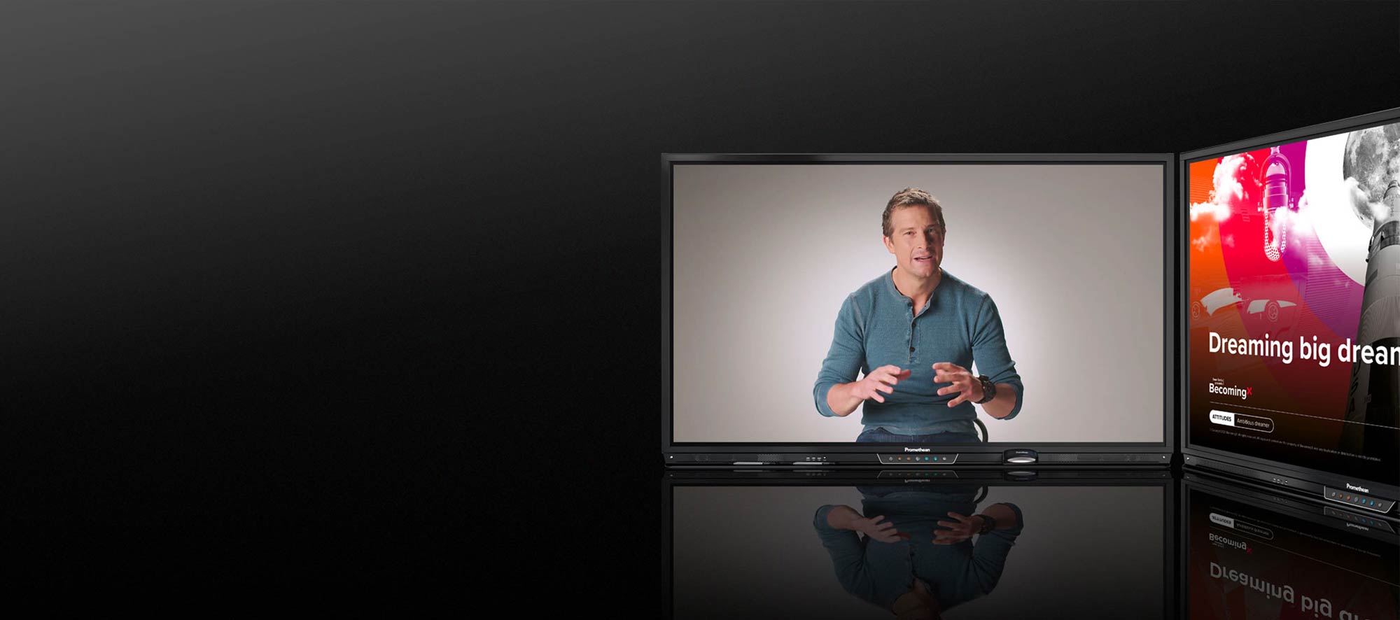 A screenshot of Bear Grylls speaking in a film, displayed on a television screen